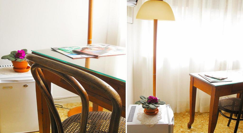 Romulus Rex Hotel Quarto foto